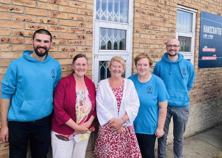 PCC SUSAN DUNGWORTH WITH HANDCRAFRED TEAM