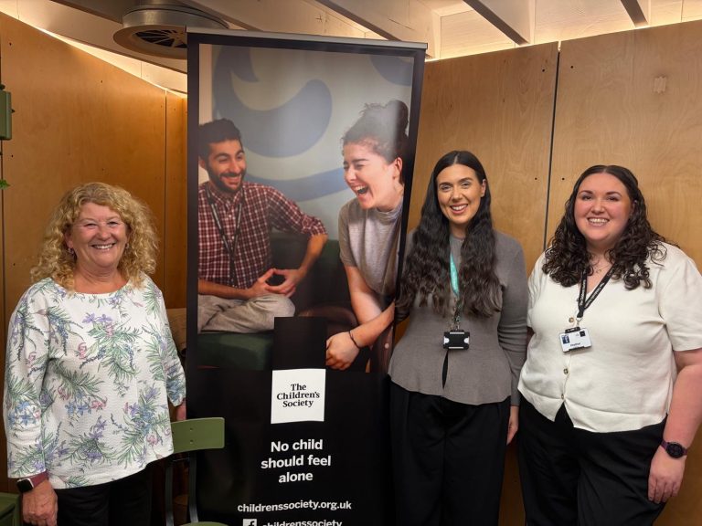 PCC Susan Dungworth with representation from the Children's Society and banner